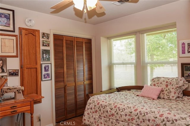 2787 Grape Way, Chico, CA 95973 - bedroom with a ceiling fan, a closet, and wood finished floors