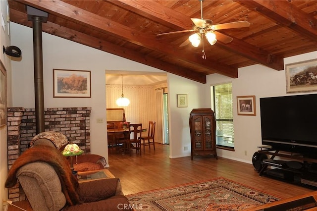 2787 Grape Way, Chico, CA 95973 - living area with wood ceiling, a ceiling fan, wood finished floors, and a wood stove
