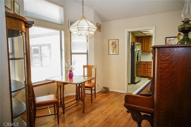 2787 Grape Way, Chico, CA 95973 - dining space with a chandelier and light wood finished floors