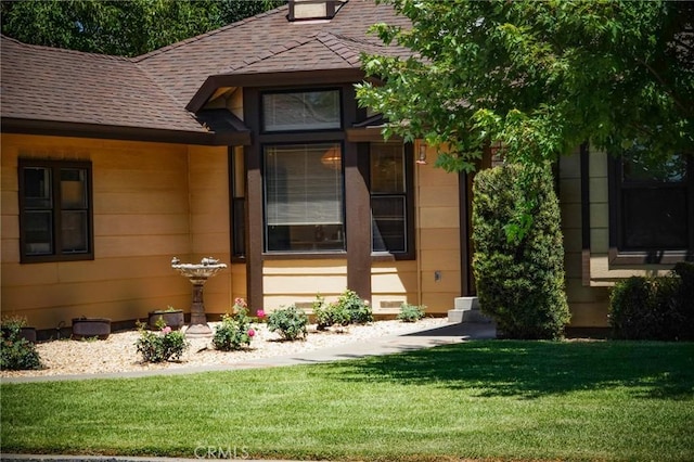 2787 Grape Way, Chico, CA 95973 - doorway to property featuring a yard and a shingled roof