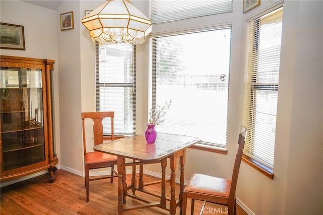 2787 Grape Way, Chico, CA 95973 - dining space featuring wood finished floors and a chandelier