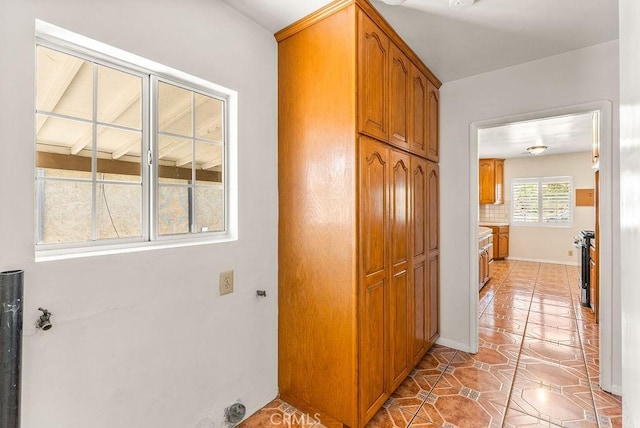 261 Twickenham Ave, Los Angeles, CA 90022 - hall with light tile patterned flooring and baseboards