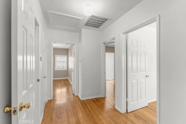 261 Twickenham Ave, Los Angeles, CA 90022 - hall with light wood-style flooring and attic access
