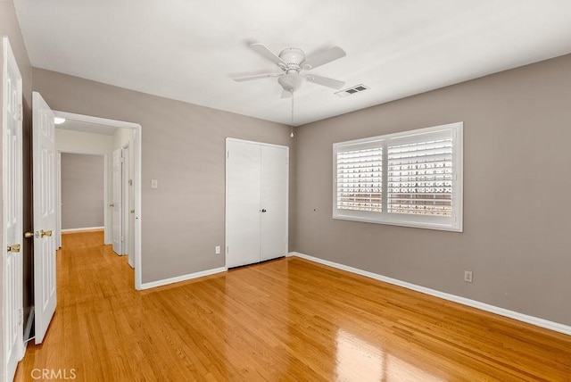 261 Twickenham Ave, Los Angeles, CA 90022 - unfurnished bedroom with light wood-type flooring, a closet, and ceiling fan