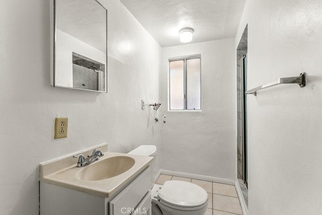 261 Twickenham Ave, Los Angeles, CA 90022 - full bathroom with vanity, tile patterned floors, and an enclosed shower
