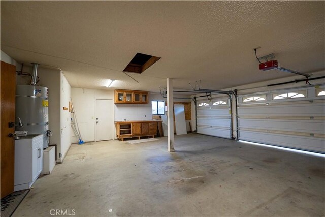 25967 Pleasant St, Hemet, CA 92544 - garage with a garage door opener and water heater