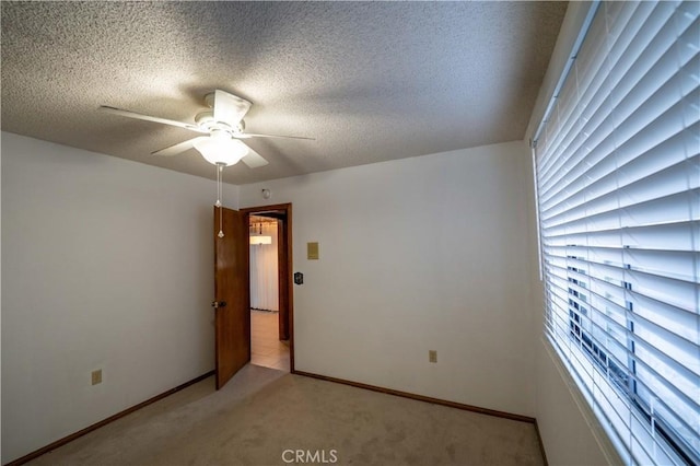 25967 Pleasant St, Hemet, CA 92544 - unfurnished room with a ceiling fan, carpet, and a textured ceiling