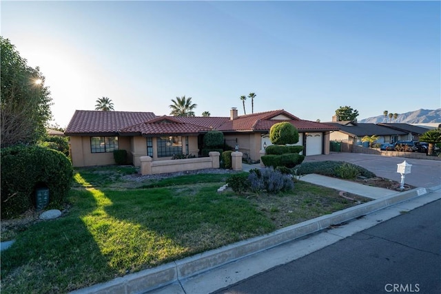 25967 Pleasant St, Hemet, CA 92544 - ranch-style home with stucco siding, a tiled roof, driveway, a garage, and a front yard
