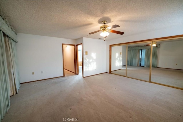 25967 Pleasant St, Hemet, CA 92544 - unfurnished bedroom with light carpet, a textured ceiling, and ceiling fan