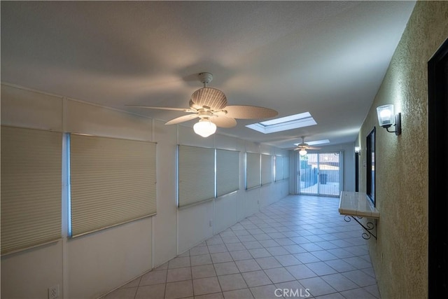 25967 Pleasant St, Hemet, CA 92544 - corridor with a skylight and light tile patterned flooring