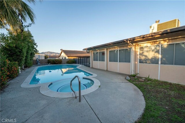 25967 Pleasant St, Hemet, CA 92544 - view of swimming pool with a fenced backyard, a patio, and a pool with connected hot tub