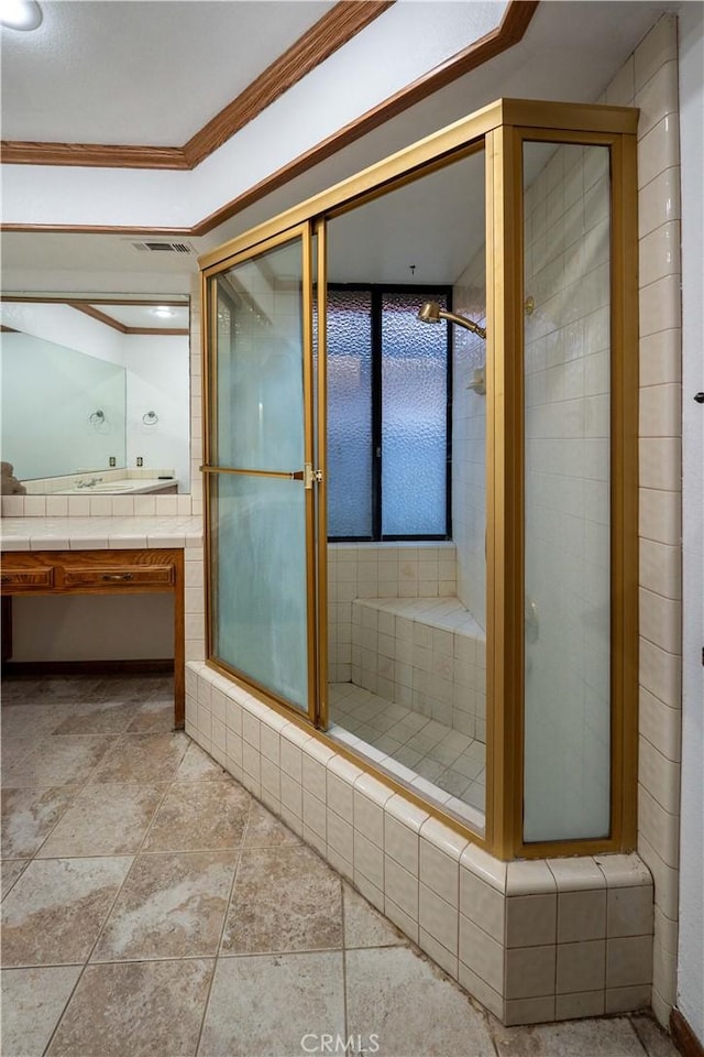 25967 Pleasant St, Hemet, CA 92544 - bathroom featuring ornamental molding, a shower stall, vanity, and stone finish floors