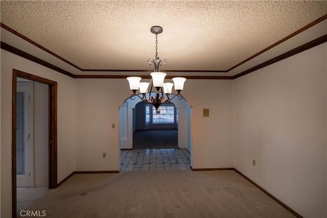 25967 Pleasant St, Hemet, CA 92544 - unfurnished dining area with ornamental molding, a chandelier, a textured ceiling, carpet floors, and arched walkways