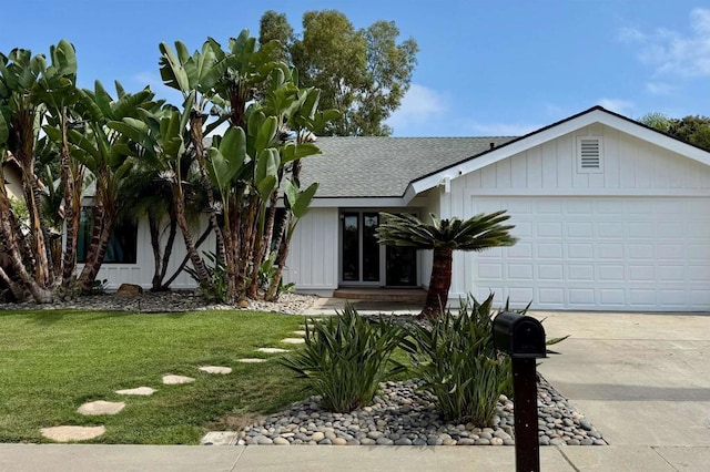 2926 Gaviota Cir, Carlsbad, CA 92009 - ranch-style home with roof with shingles, a front yard, driveway, and a garage