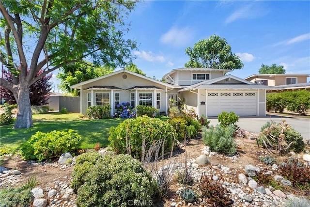 2734 Grove St, La Verne, CA 91750 - view of front facade with a garage, stucco siding, and driveway