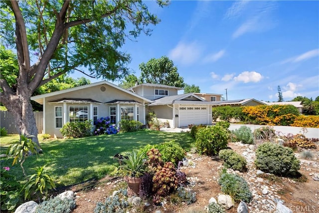 2734 Grove St, La Verne, CA 91750 - view of front of property featuring an attached garage and stucco siding