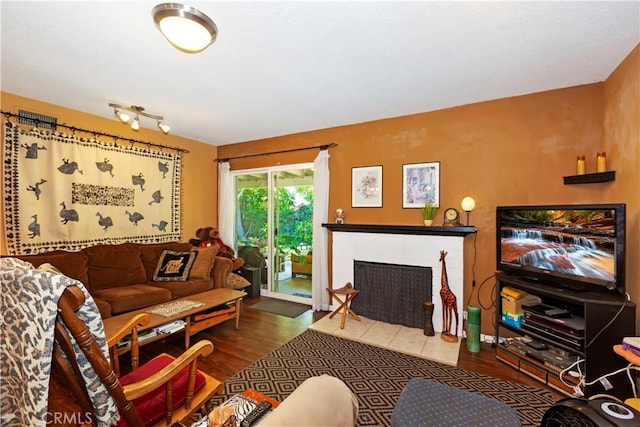 2734 Grove St, La Verne, CA 91750 - living area with a fireplace and wood finished floors