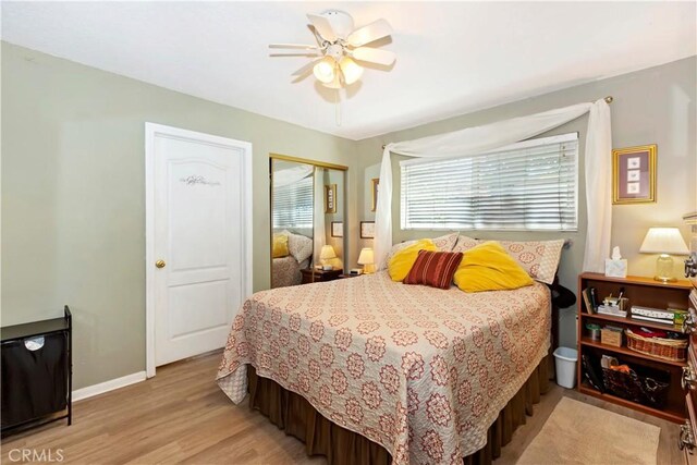 2734 Grove St, La Verne, CA 91750 - bedroom with light wood finished floors, a ceiling fan, and a closet