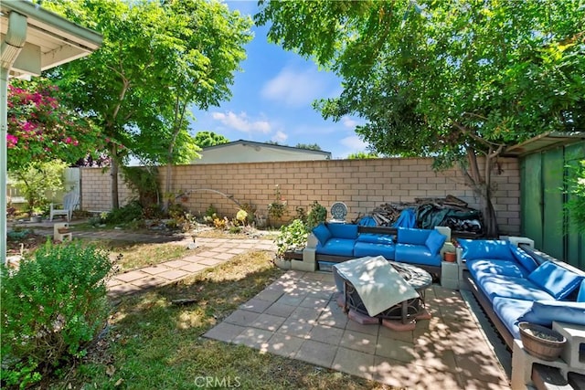 2734 Grove St, La Verne, CA 91750 - fenced backyard with outdoor lounge area and a patio