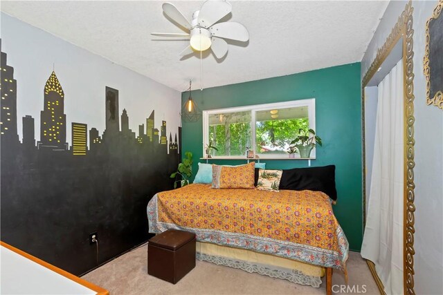 2734 Grove St, La Verne, CA 91750 - carpeted bedroom with a textured ceiling and a ceiling fan
