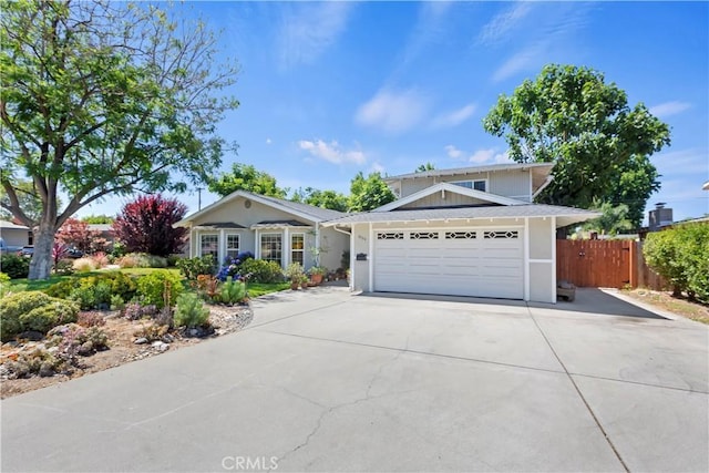 2734 Grove St, La Verne, CA 91750 - view of front of home featuring an attached garage, concrete driveway, and stucco siding