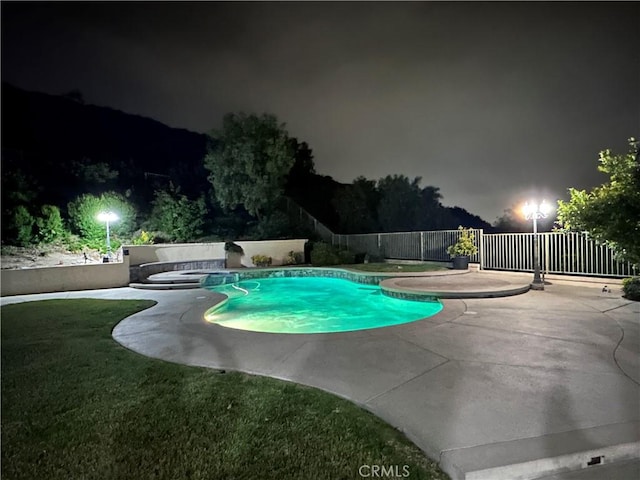 19861 Sunset Vista Rd, Walnut, CA 91789 - pool at twilight featuring a patio area