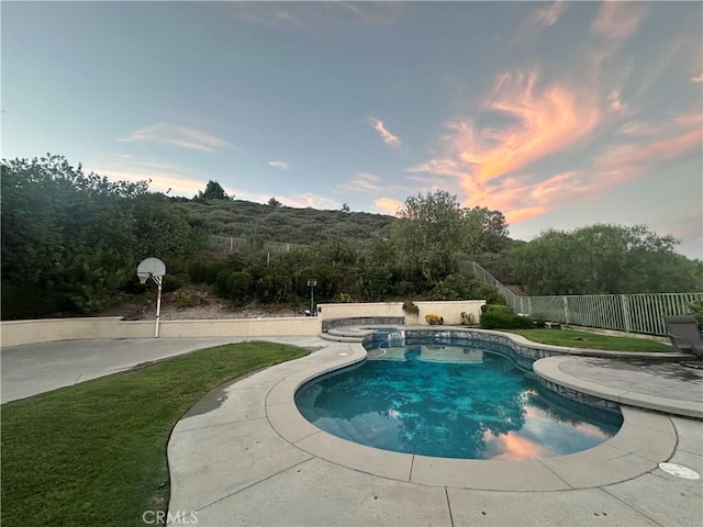19861 Sunset Vista Rd, Walnut, CA 91789 - pool at dusk featuring a fenced backyard