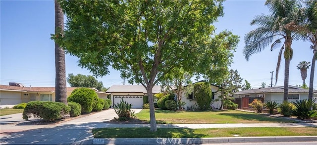 1359 W I St, Ontario, CA 91762 - ranch-style home featuring concrete driveway and a garage