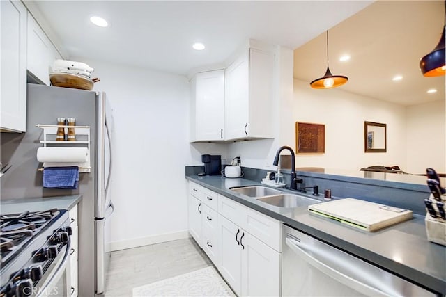 525 S Berendo St Unit 212, Los Angeles, CA 90020 - kitchen featuring appliances with stainless steel finishes, dark countertops, white cabinetry, recessed lighting, and decorative light fixtures