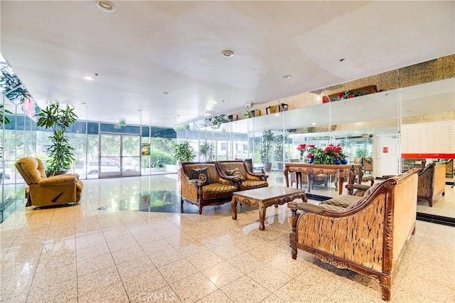 525 S Berendo St Unit 212, Los Angeles, CA 90020 - common area featuring floor to ceiling windows, a sunroom, and recessed lighting