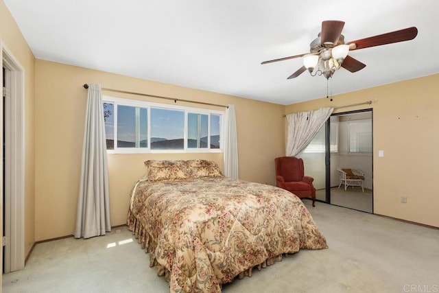 10879 Charing Cross Rd, Spring Valley, CA 91978 - bedroom featuring light carpet, multiple windows, and a ceiling fan