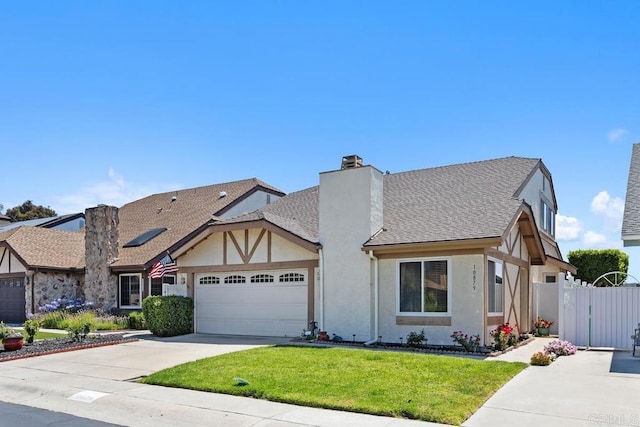 10879 Charing Cross Rd, Spring Valley, CA 91978 - english style home featuring an attached garage, a gate, stucco siding, driveway, and a chimney