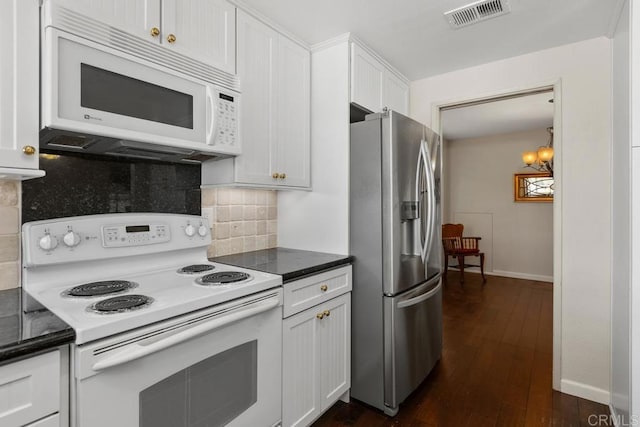 10879 Charing Cross Rd, Spring Valley, CA 91978 - kitchen with white appliances, decorative backsplash, white cabinetry, and dark wood-style flooring
