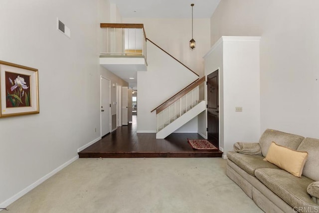 10879 Charing Cross Rd, Spring Valley, CA 91978 - living room with carpet floors, stairs, and a towering ceiling