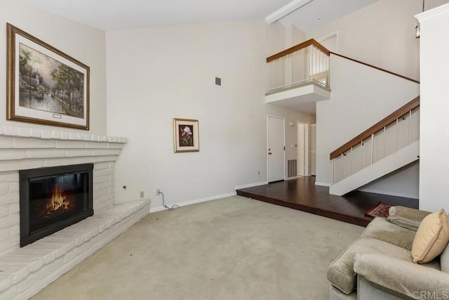 10879 Charing Cross Rd, Spring Valley, CA 91978 - living room with carpet floors, a fireplace, stairway, high vaulted ceiling, and beamed ceiling