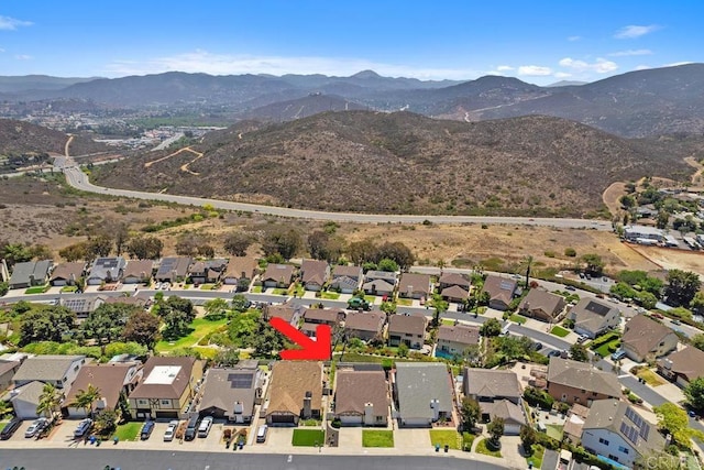 10879 Charing Cross Rd, Spring Valley, CA 91978 - aerial view of property and surrounding area with a mountainous background and nearby suburban area