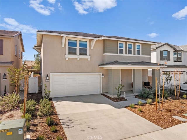 30181 Adrift Ln, Menifee, CA 92584 - view of front of house featuring concrete driveway, a garage, covered porch, and stucco siding