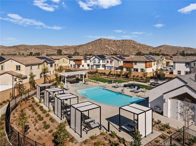 30181 Adrift Ln, Menifee, CA 92584 - community pool featuring a residential view, a mountain view, a pergola, and a patio area