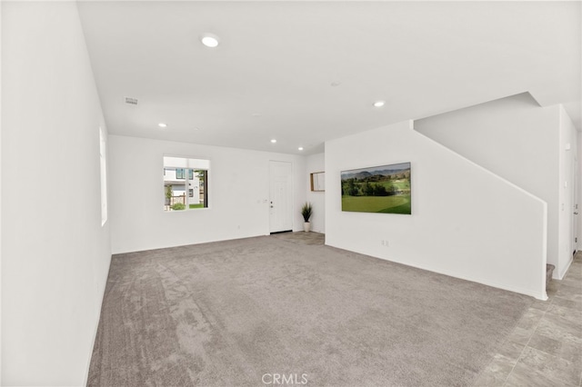 30181 Adrift Ln, Menifee, CA 92584 - unfurnished living room featuring recessed lighting and light carpet