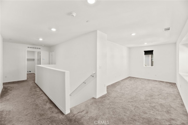 30181 Adrift Ln, Menifee, CA 92584 - empty room featuring carpet floors, a smoke detector, and recessed lighting