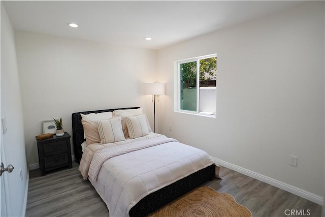 77 W Washington Blvd, Pasadena, CA 91103 - bedroom with wood finished floors and recessed lighting