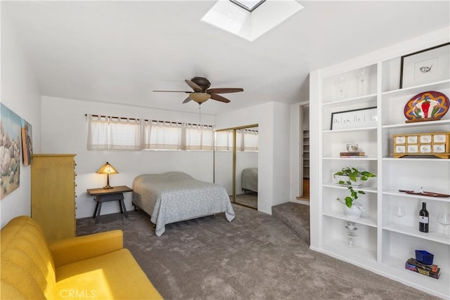 719 S Amstutz Ave, Anaheim, CA 92802 - carpeted bedroom with a skylight, a closet, and ceiling fan