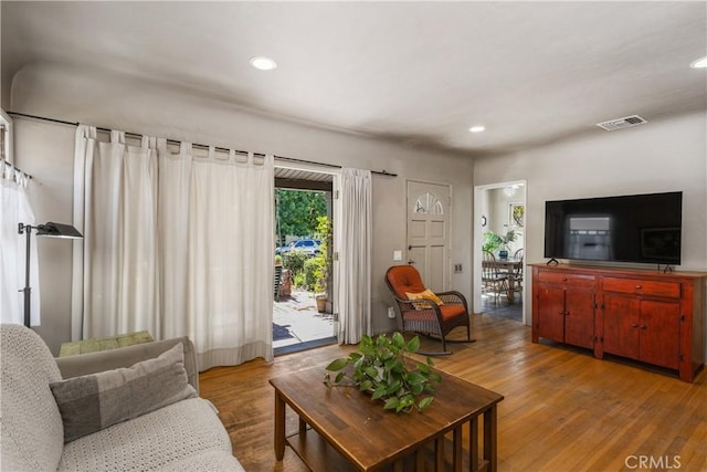 719 S Amstutz Ave, Anaheim, CA 92802 - living room featuring wood finished floors and recessed lighting