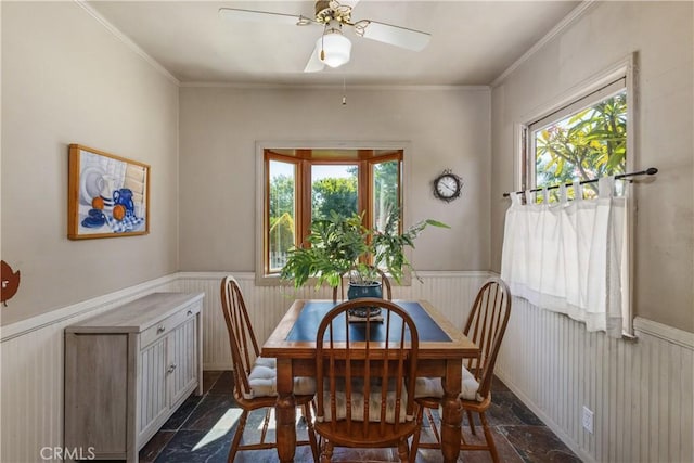 719 S Amstutz Ave, Anaheim, CA 92802 - dining space with wainscoting, plenty of natural light, ceiling fan, and ornamental molding