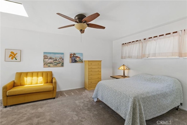719 S Amstutz Ave, Anaheim, CA 92802 - carpeted bedroom with ceiling fan and a skylight