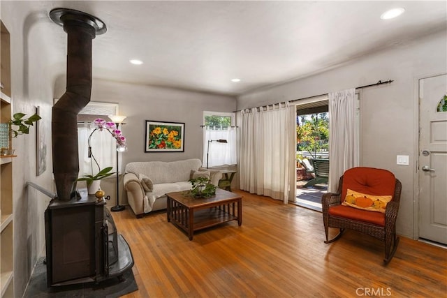 719 S Amstutz Ave, Anaheim, CA 92802 - living area featuring a wood stove, wood finished floors, and recessed lighting