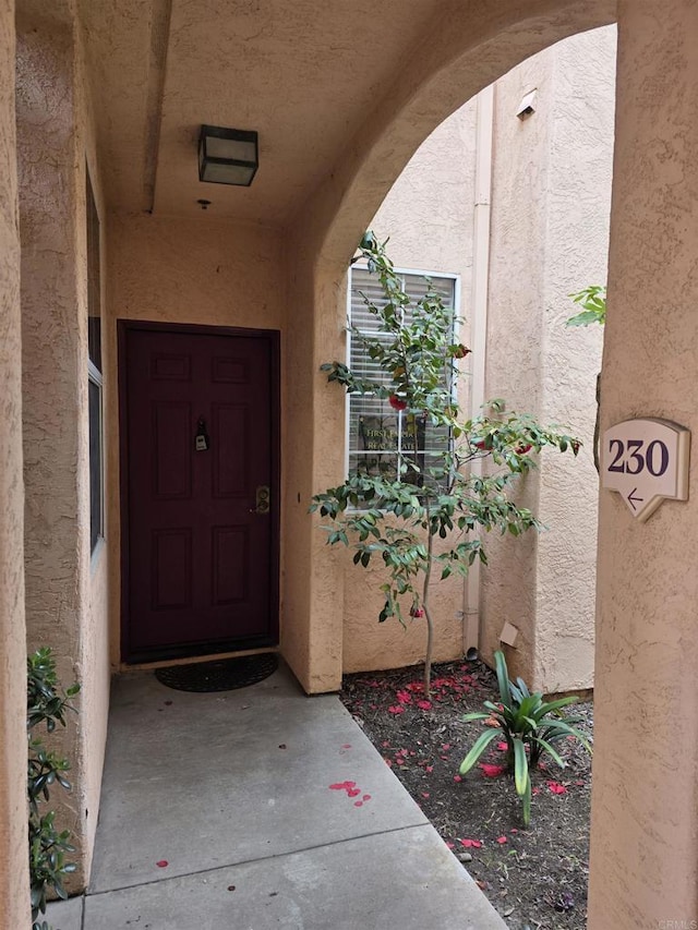 18680 Caminito Cantilena Unit 230, San Diego, CA 92128 - entrance to property featuring stucco siding
