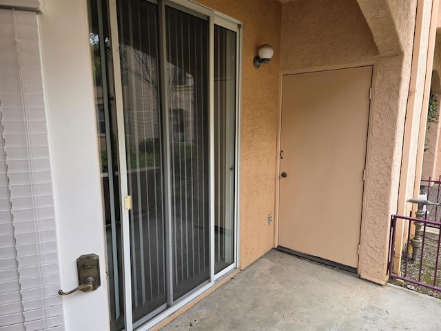 18680 Caminito Cantilena Unit 230, San Diego, CA 92128 - entrance to property featuring stucco siding
