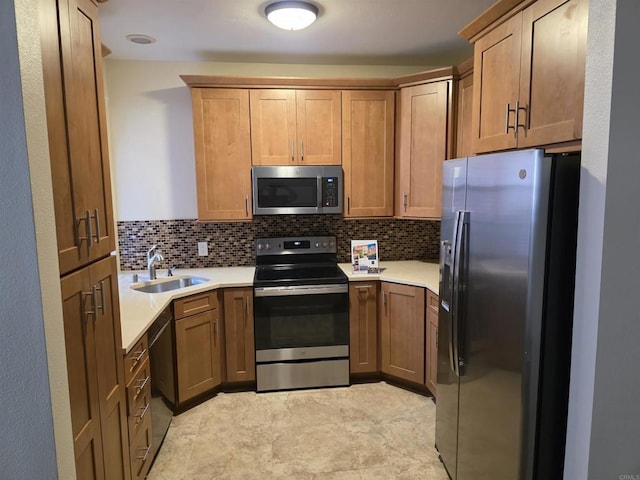 18680 Caminito Cantilena Unit 230, San Diego, CA 92128 - kitchen with appliances with stainless steel finishes, backsplash, and light countertops