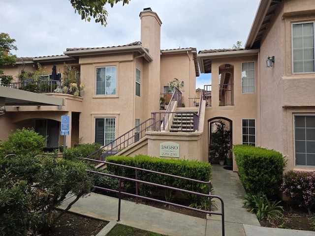 18680 Caminito Cantilena Unit 230, San Diego, CA 92128 - view of property with stairway